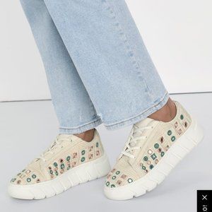 Free People catch me if you can mirror combo sneakers.